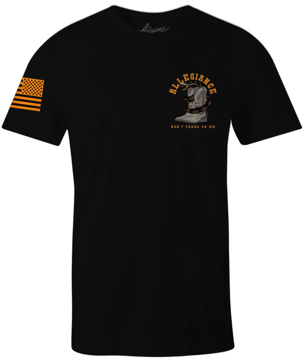 Front of Western Tee in black with small rattlesnake and cowboy boots chest graphic and American flag sleeve